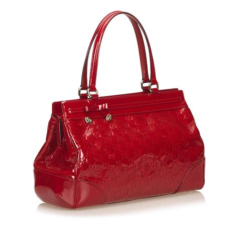 red patent leather purse